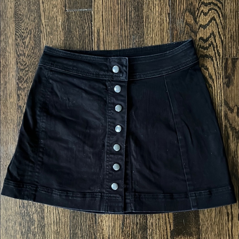3/$15 Free People black denim mini skirt with snaps